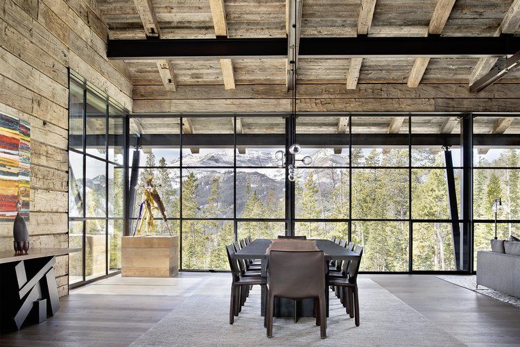 Optimum architectural steel windows and doors on a mountain home, manufacturer photo