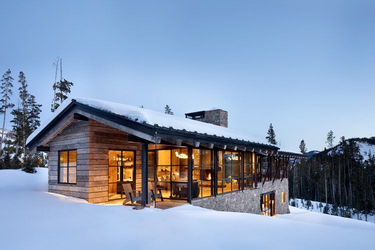 Optimum architectural steel windows and doors on a mountain home, manufacturer photo