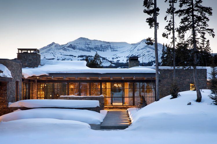 Optimum architectural steel windows and doors on a mountain home, manufacturer photo