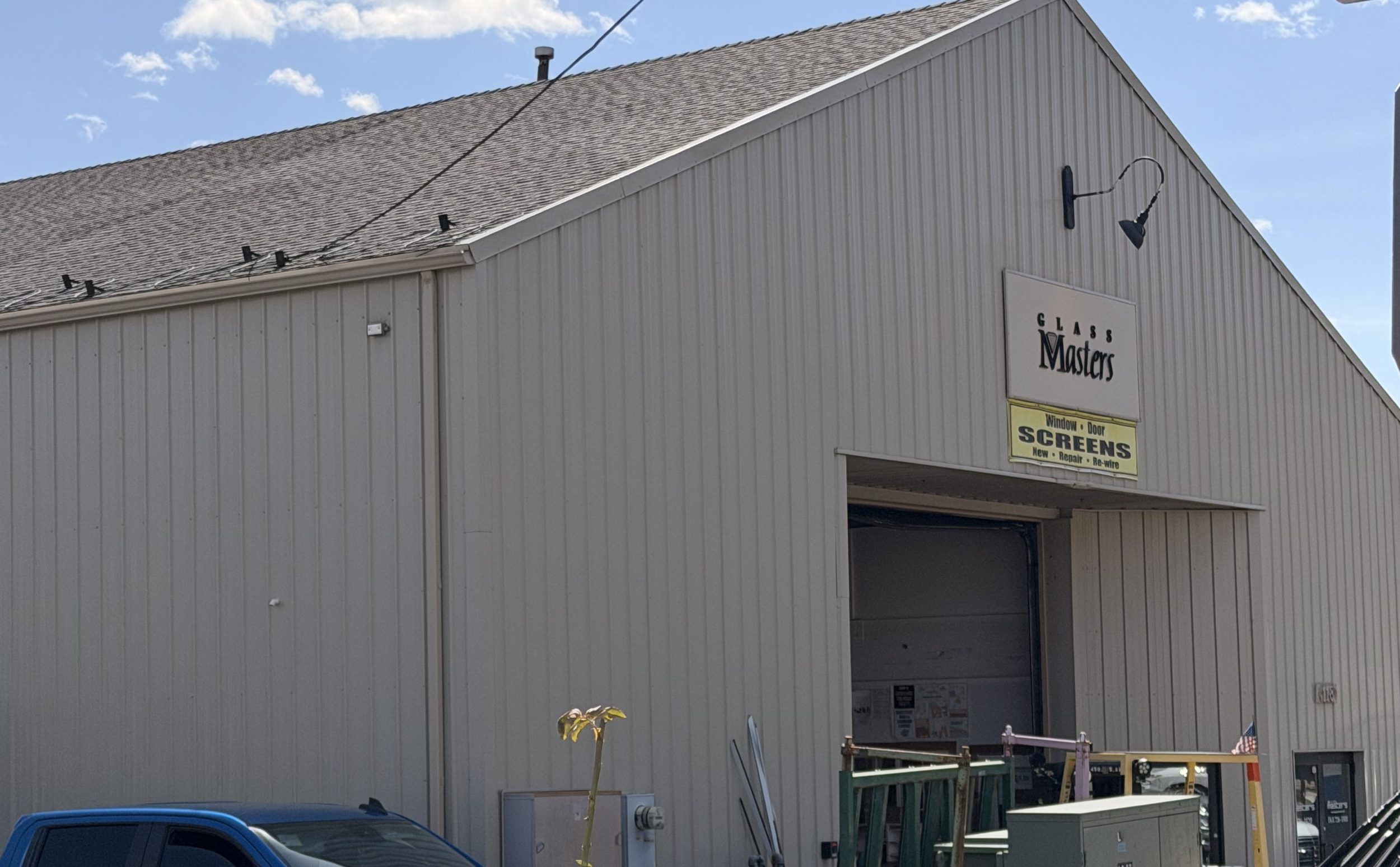 The Glass Masters shop on Lewis Street in Ketchum, with the screens sign over the door