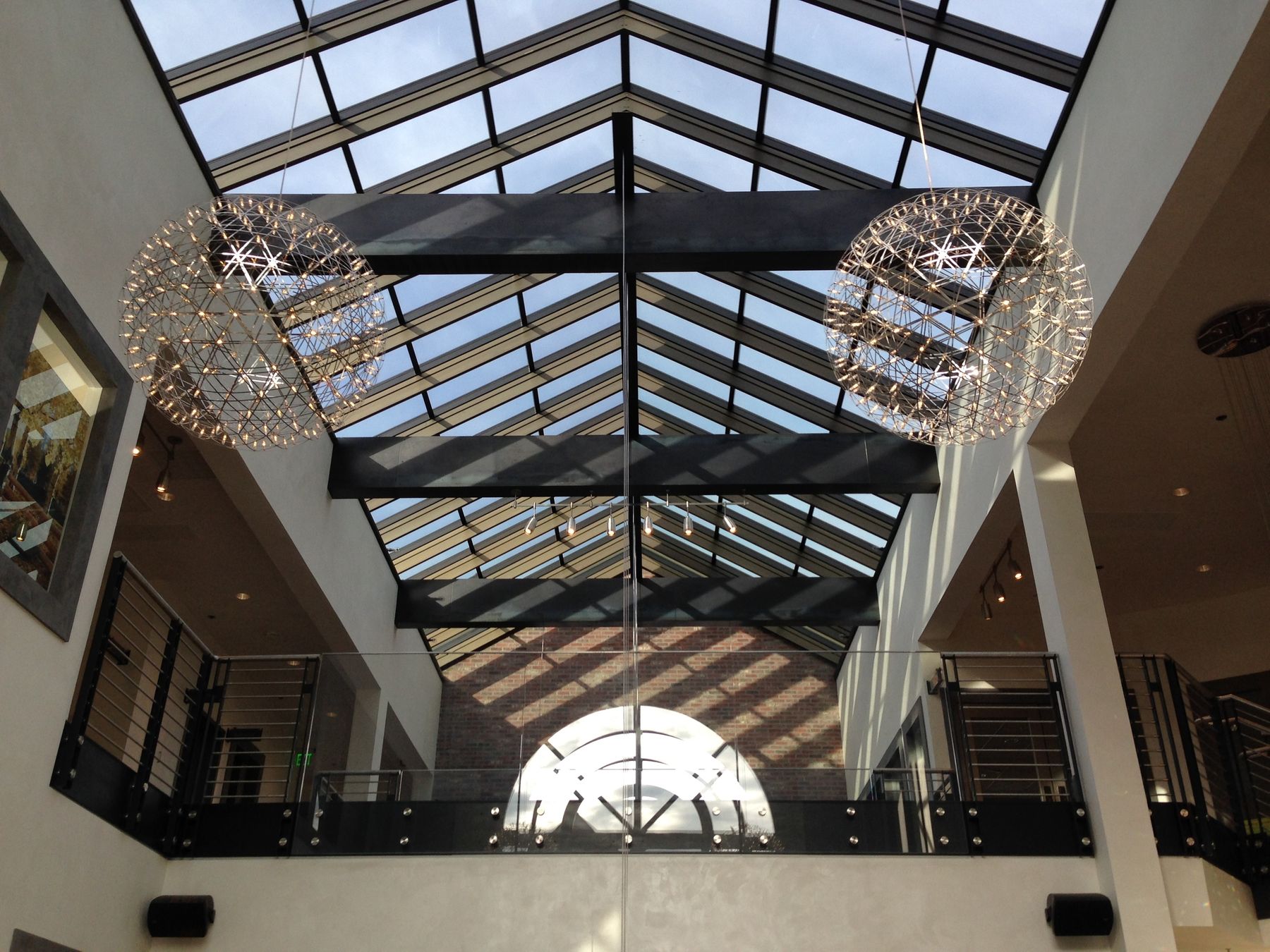 Glazed gable skylight over a vaulted interior